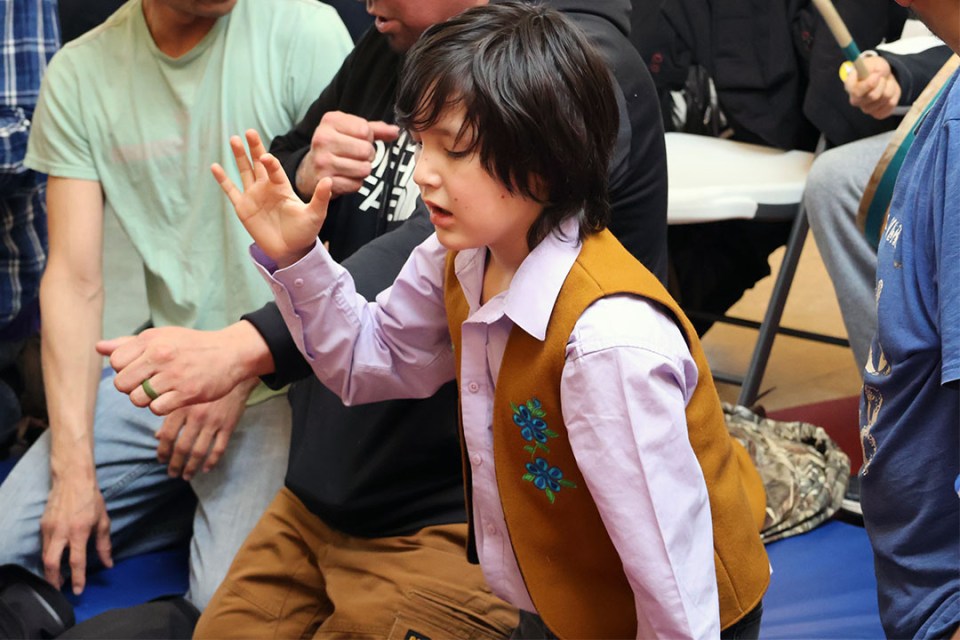 Young boy plays the multigenerational game