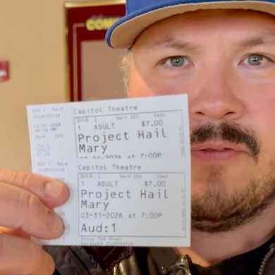 Jesse Wheeler with tickets for the last screening at Yellowknife's Capitol Theatre on March 31, 2026. Ollie Williams/Cabin Radio