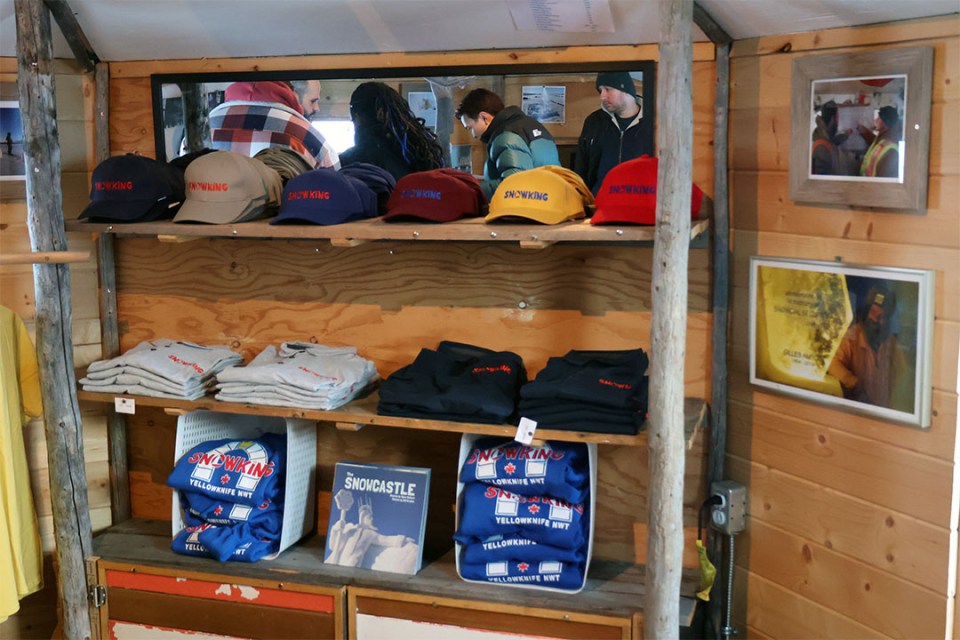Merchandise displayed on wooden shelves