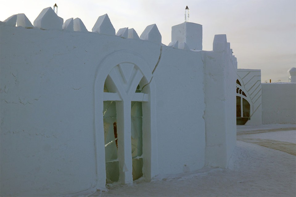 Castle built from snow with ice for windows. A crack appears in part of the wall