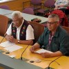 Lawrence Norbert, left, and George Nerysoo, right, speak to MLAs about a proposed anti-SLAPP law.
