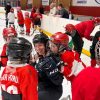 A submitted photo of Shakita Jensen with young hockey players in Iceland.