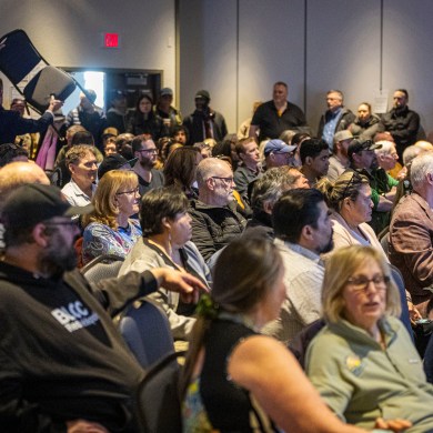 The crowd at a DND public meeting in Yellowknife on April 23, 2026. Ollie Williams/Cabin Radio