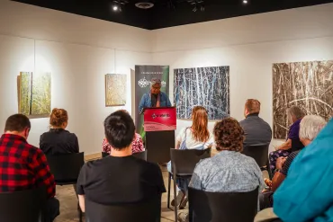 Stephen Kakfwi reads at a NorthWords NWT event in 2024. Photo: NorthWords NWT