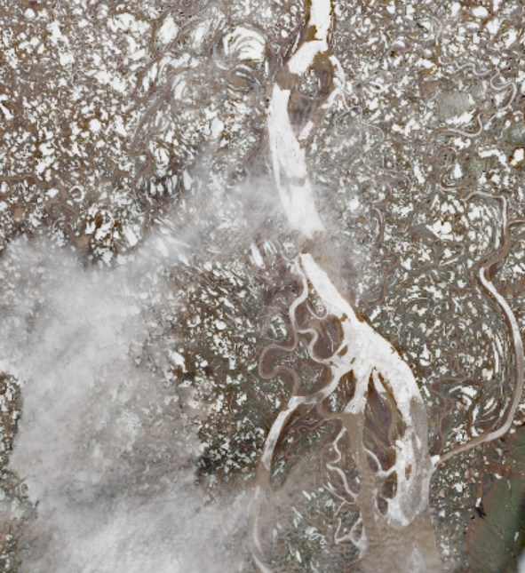 Satellite imagery from May 24 showing rubble ice jammed in the "Turtle" area of the Mackenzie Delta, where the river splits around the Mackenzie Islands. Image posted to the Department of Environment and Climate Change's website