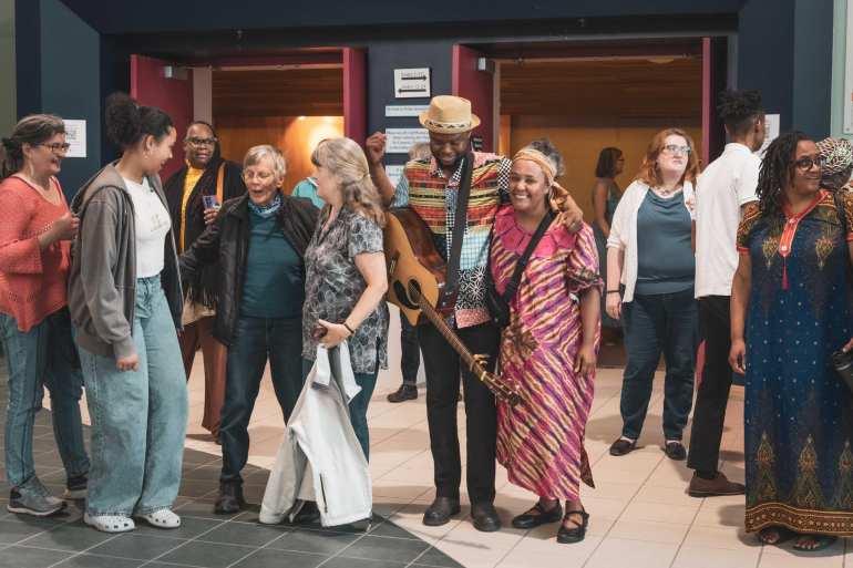 Munya Mataruse (with the guitar) and community members at a previous Africa Day Celebration. Submitted by Munya Mataruse