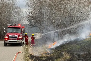 Fort Simpson volunteer firefighters conducting a prescribed burn at Papal Flats on May 13, 2026. Submitted by Tyler Pilling