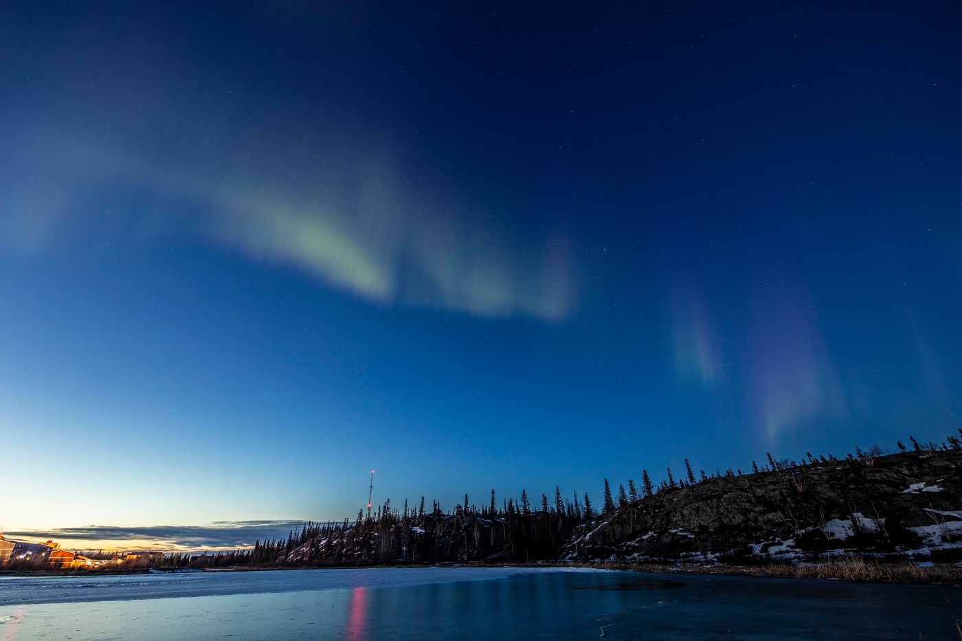 "Over Rat Lake, I tried to catch the season's last aurora before the sun relentlessly dominates our 'night' sky," said photographer Bill Braden.