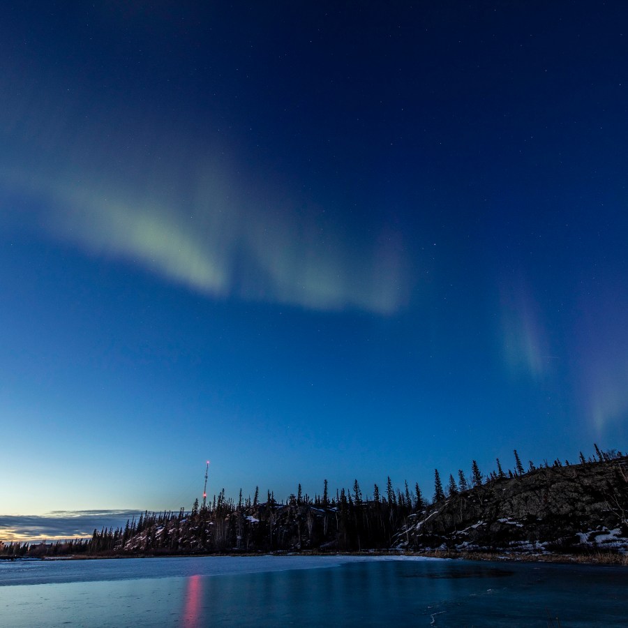 "Over Rat Lake, I tried to catch the season's last aurora before the sun relentlessly dominates our 'night' sky," said photographer Bill Braden.