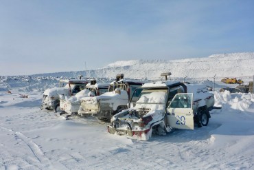 Equipment recently purchased from the now-closed Diavik mine sits in the snow at Ekati in March 2026. Photo: GNWT