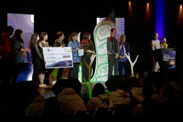The Land Remembers Us team members accept their award in a still from a live stream of the 2026 Arctic Inspiration Prize ceremony in Whitehorse.