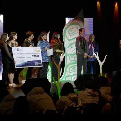 The Land Remembers Us team members accept their award in a still from a live stream of the 2026 Arctic Inspiration Prize ceremony in Whitehorse.
