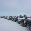 Vehicles used at the now-paused Point Lake development are arranged for storage at the Ekati mine site. Photo: GNWT