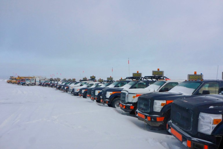 Vehicles used at the now-paused Point Lake development are arranged for storage at the Ekati mine site. Photo: GNWT