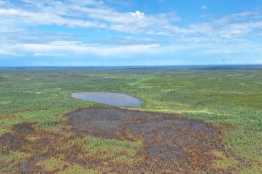 The burn scar of fire SS005 from the air. Photo: NWT Fire