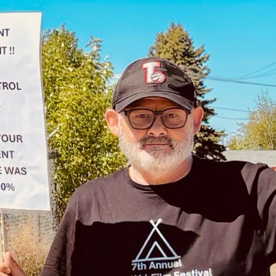 Tenant Christopher Daw organized a rent rally in Fort Simpson on May 30, 2026. Photo: Supplied