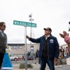 From left: Mayor Ben Hendriksen, Chief Ernest Betsina and Chief Fred Sangris unveil a Wıìlıìdeh Avenue street sign. Kai Wilson/Cabin Radio