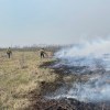 Parks Canada wildland firefighters work the perimeter of a fire near a whooping crane nesting area in the Wood Buffalo National Park on June 3, 2026. Photo: Parks Canada