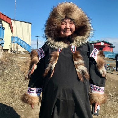 Erin Felix shows off her traditional outfit outside Kitti Hall on June 5, 2026. Cody Punter/Cabin Radio