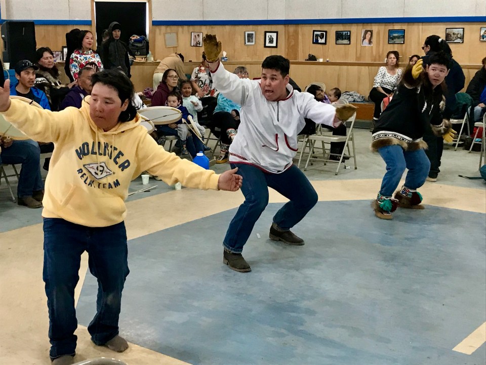 Drumming and dancing as part of Tuktoyaktuk's Inuvialuit Day celebrations. Cody Punter/Cabin Radio