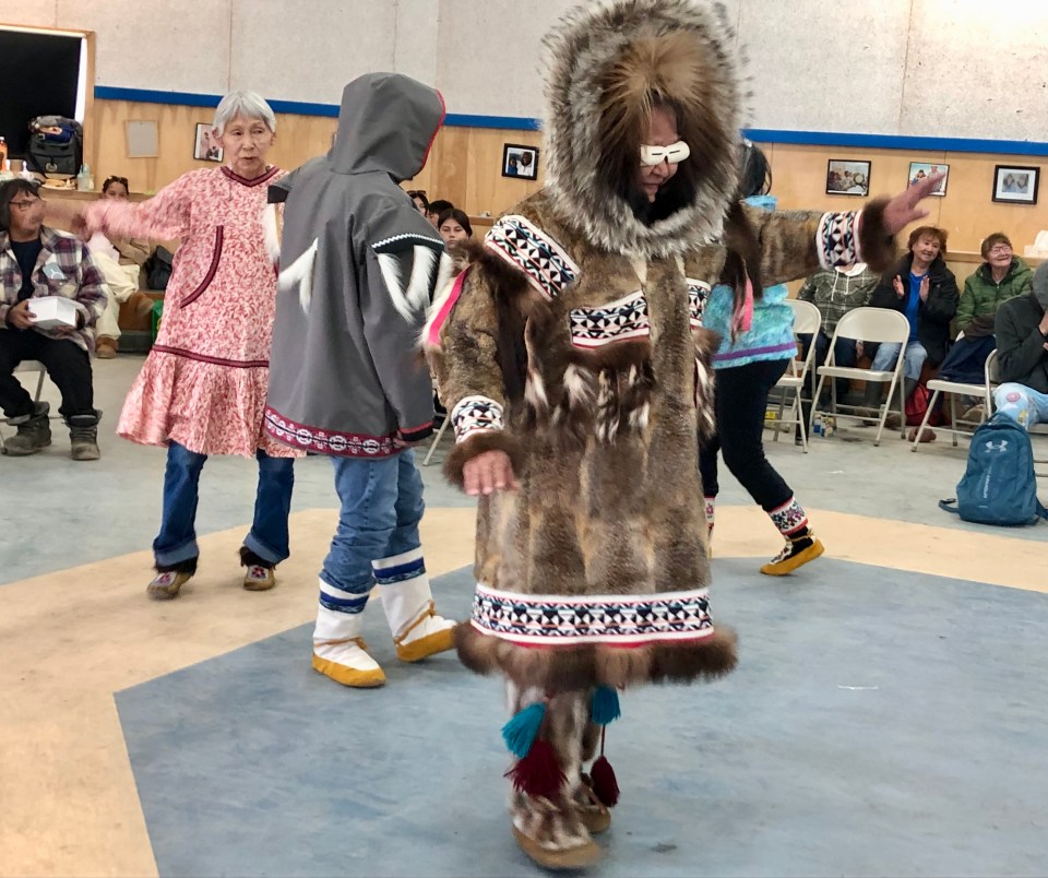 Drumming and dancing as part of Tuktoyaktuk's Inuvialuit Day celebrations. Cody Punter/Cabin Radio