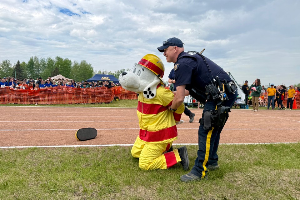 Sparky the Hay River fire hall mascot suffers an ignominious end to proceedings after RCMP win the head-to-head contest. Ollie Williams/Cabin Radio