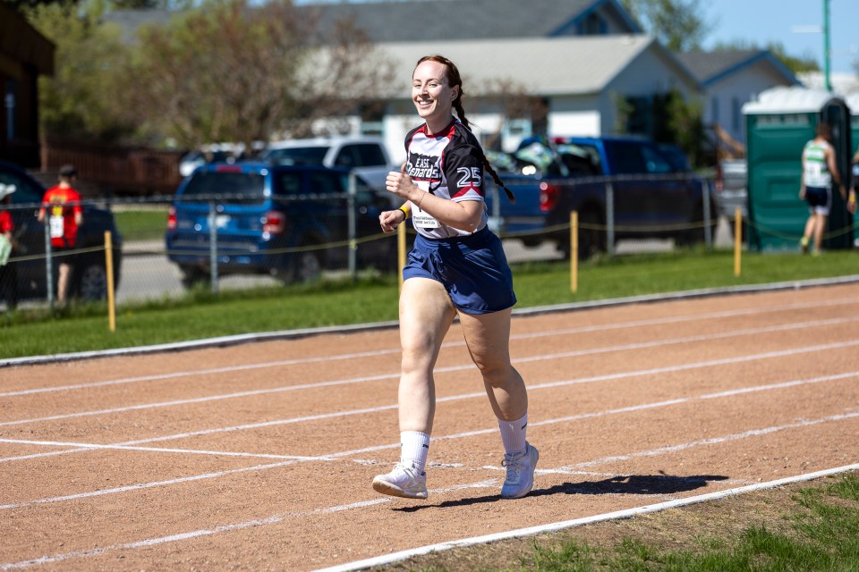 Nerika Caissie running on behalf of École Allain St-Cyr. Ollie Williams/Cabin Radio