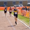 Logan Doll racing the 5,000m at Track and Field 2026. Ollie Williams/Cabin Radio