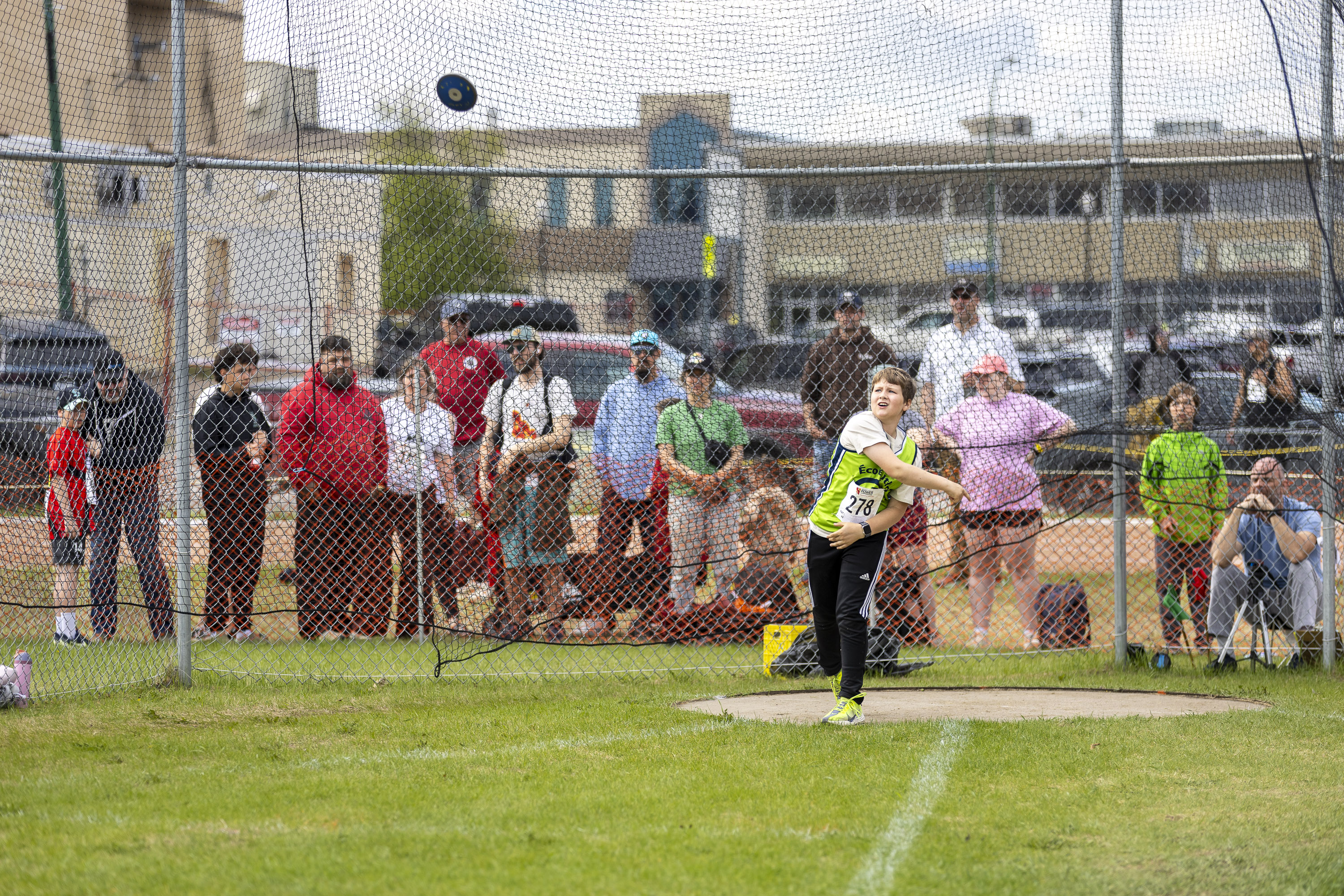 William Mansfield throws the discus. Ollie Williams/Cabin Radio
