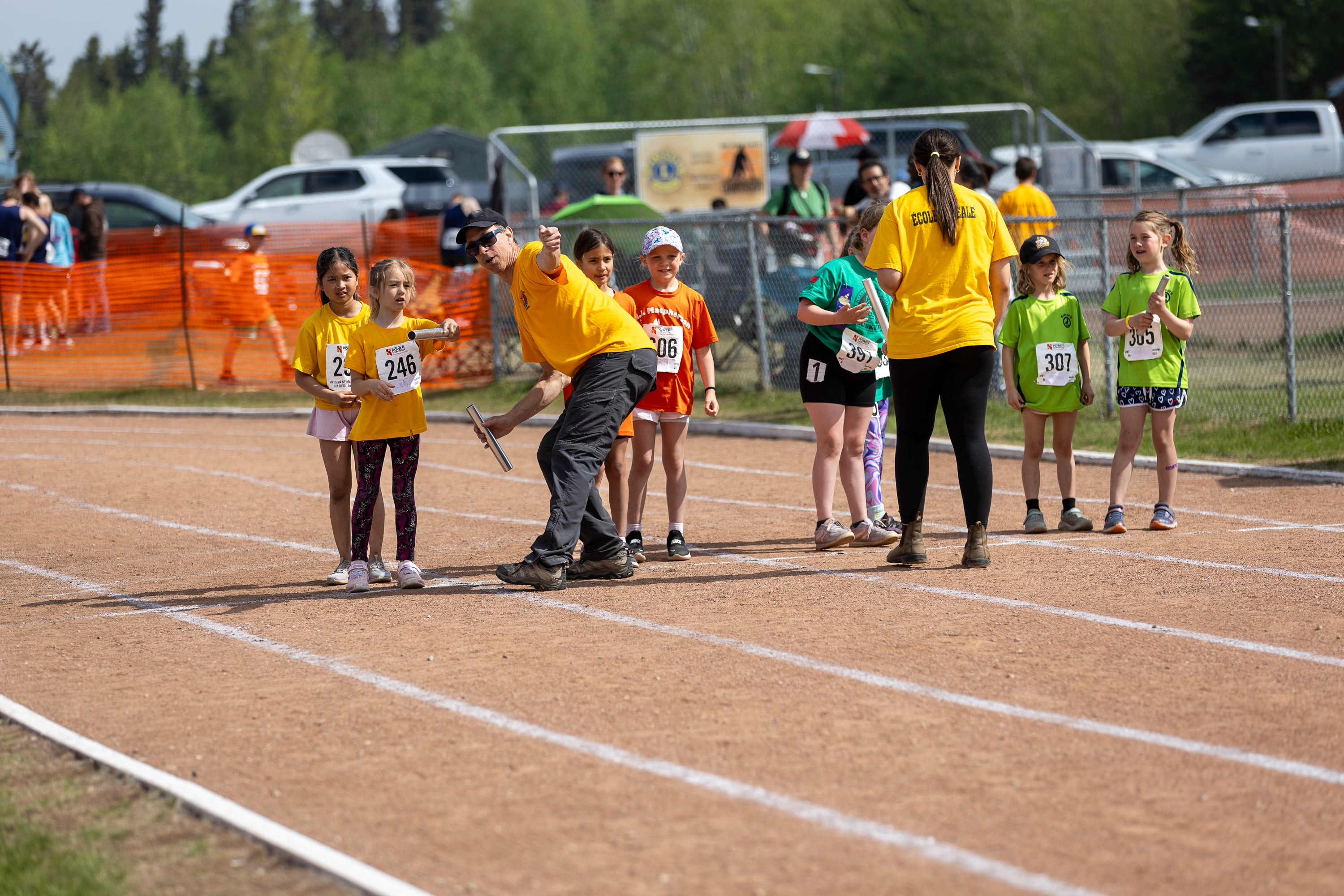 Negotiations take place regarding the general direction in which a youth "shuttle" relay will be run. Ollie Williams/Cabin Radio