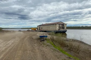 The barge SBMT 802 docked at Inuvik's boat launch on June 15, 2026. Ollie Williams/Cabin Radio