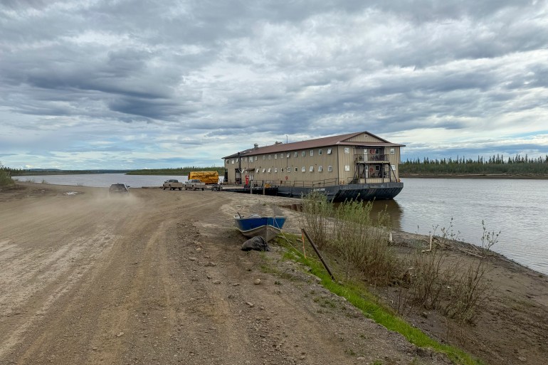 The barge SBMT 802 docked at Inuvik's boat launch on June 15, 2026. Ollie Williams/Cabin Radio