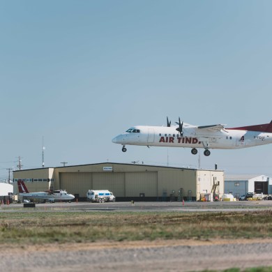 An Air Tindi plane lands at the Yellowknife Airport in May 2026. Sarah Pruys/Cabin Radio