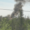 The Yellowknife dump's second fire of the day spews smoke into the air on June 24, 2026. Photo: Submitted