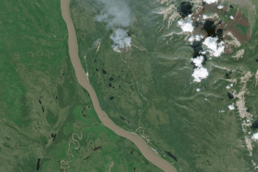 A Sentinel-2 satellite image shows wildfire FS-015 north of Wrigley on June 27, 2026.