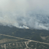 Fire FS016's eastern edge near Fort Simpson's Wildrose subdivision at 4:45pm on June 30, 2026. Photo: NWT Fire