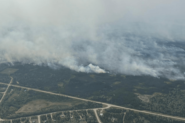 Fire FS016's eastern edge near Fort Simpson's Wildrose subdivision at 4:45pm on June 30, 2026. Photo: NWT Fire