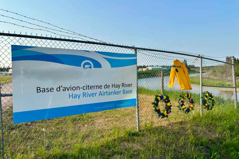 A memorial in Hay River to three people who lost their lives in a firefighting plane crash west of Fort Simpson in June 2026. Photo: Stephen Fochuk