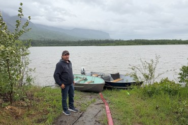 A submitted photo shows Chief Steve Vital at the South Nahanni riverbank near the band office early on June 16, 2026.