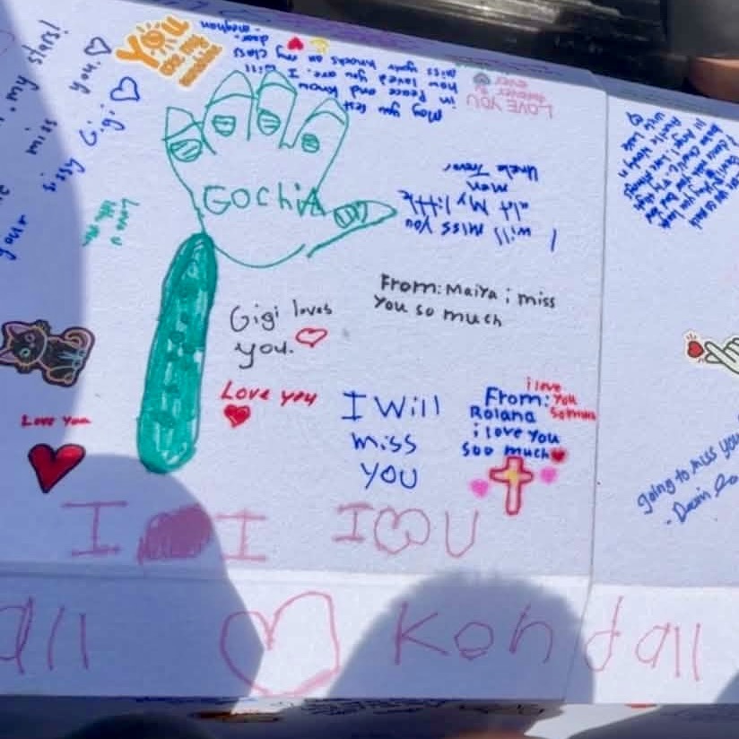 Messages left on Gewii's casket. Photo submitted by Missy Mantla