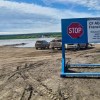 People wait for the Peel River ferry to reopen. Photo: SamsonLTD