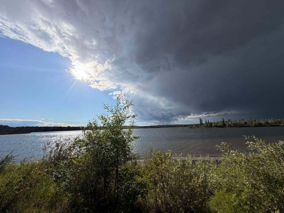 "I tried to outbike the rain on Frame Lake. I lost." Photo: Sam Marie