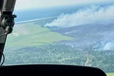 Wildfire FS016 is seen from the air on July 7, 2026. Photo: Kele Antoine