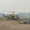 Crews working on a wildfire near Wrigley in July 2026. Photo: NWT Fire