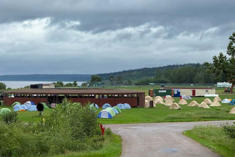 A photo published by Kele Antoine shows firefighters' tents at Fort Simpson's papal grounds on a welcome soggy day.