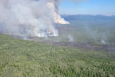 An NWT Fire image of wildfire FS015 outside Wrigley on July 18, 2026.