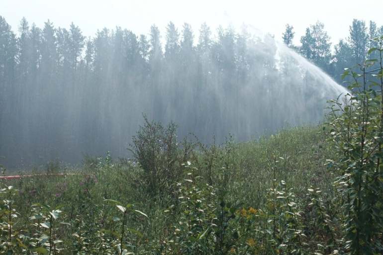 Water falls from a high-volume suppression system installed in Wrigley earlier this week. Photo: NWT Fire