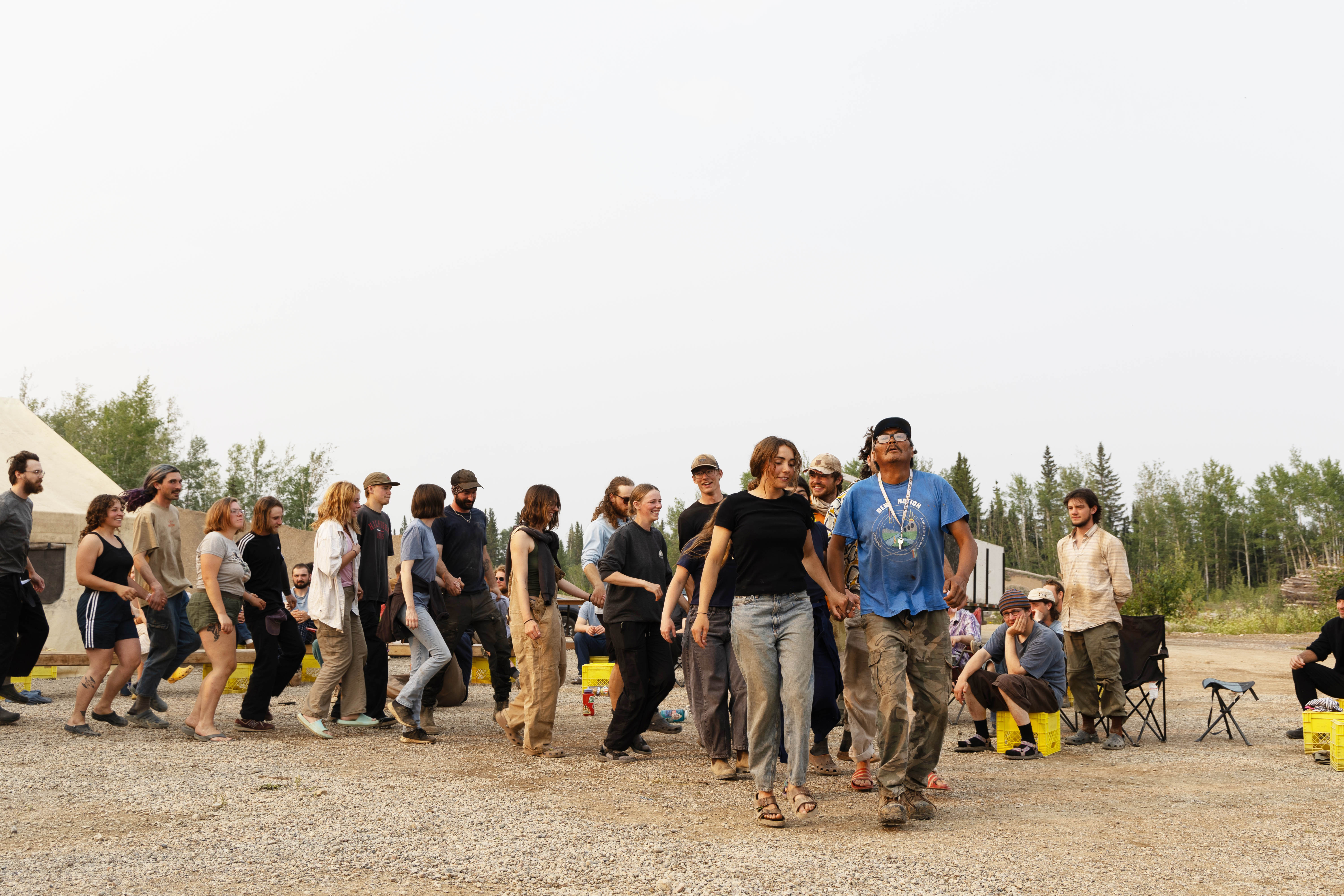 Tree planters and Tthets’éhk’édélı̨ First Nation members participated in a dance. Claire McFarlane/Cabin Radio