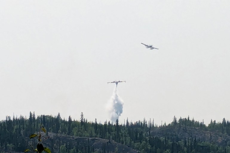 Aircraft attack fire ZF060 northeast of Yellowknife on July 18, 2026. Photo: Bill Braden