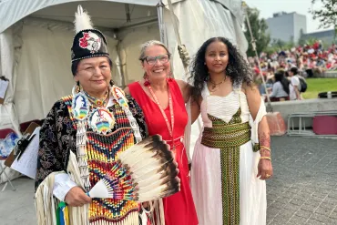 Stephanie Yuill, centre, with Canada Day performers. Dieselle Ford/Cabin Radio